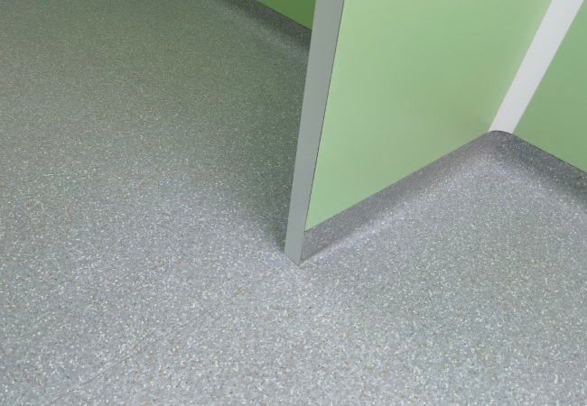 Real cleanroom interior showing wall panel floor interface and cleanable corner detailing